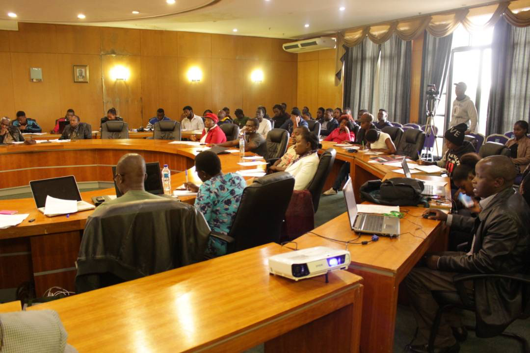 Participants at the community lecture follow proceedings at NUST