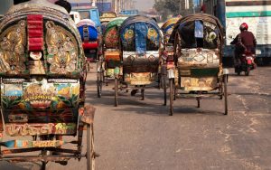 A variety of Rickshaws pictured from behind
