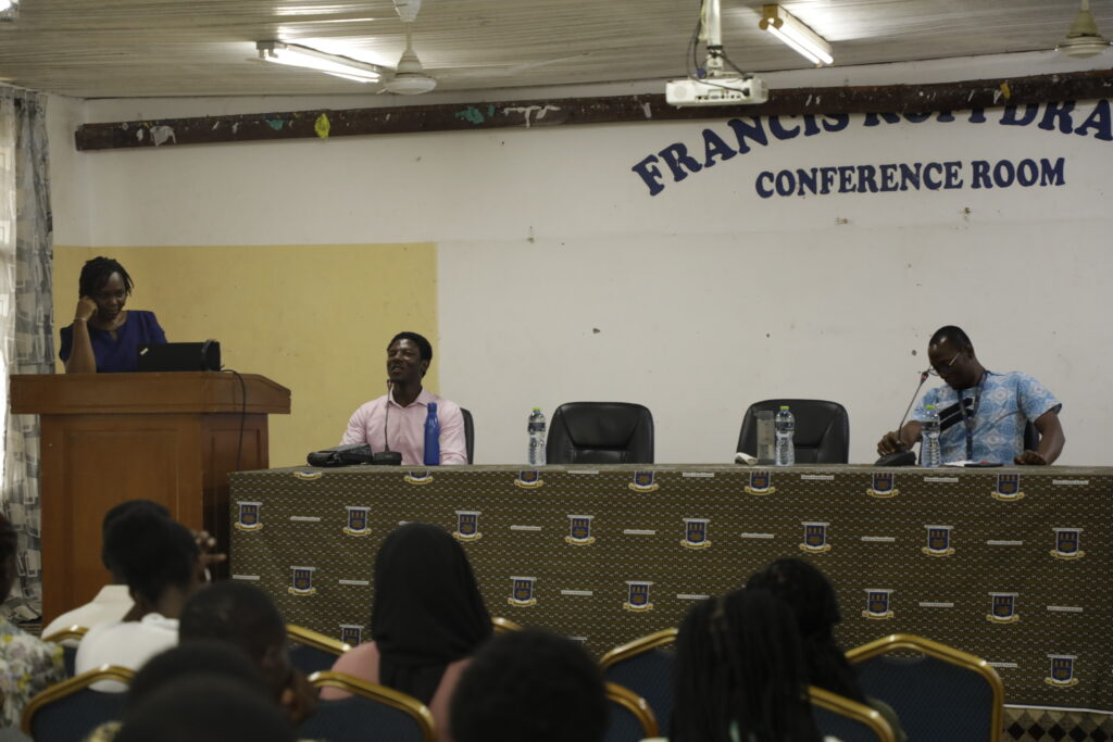 Gerald Arhin delivers a talk at a seminar organised at the University of Ghana. 